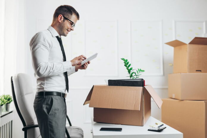 Businessman moving into a new office